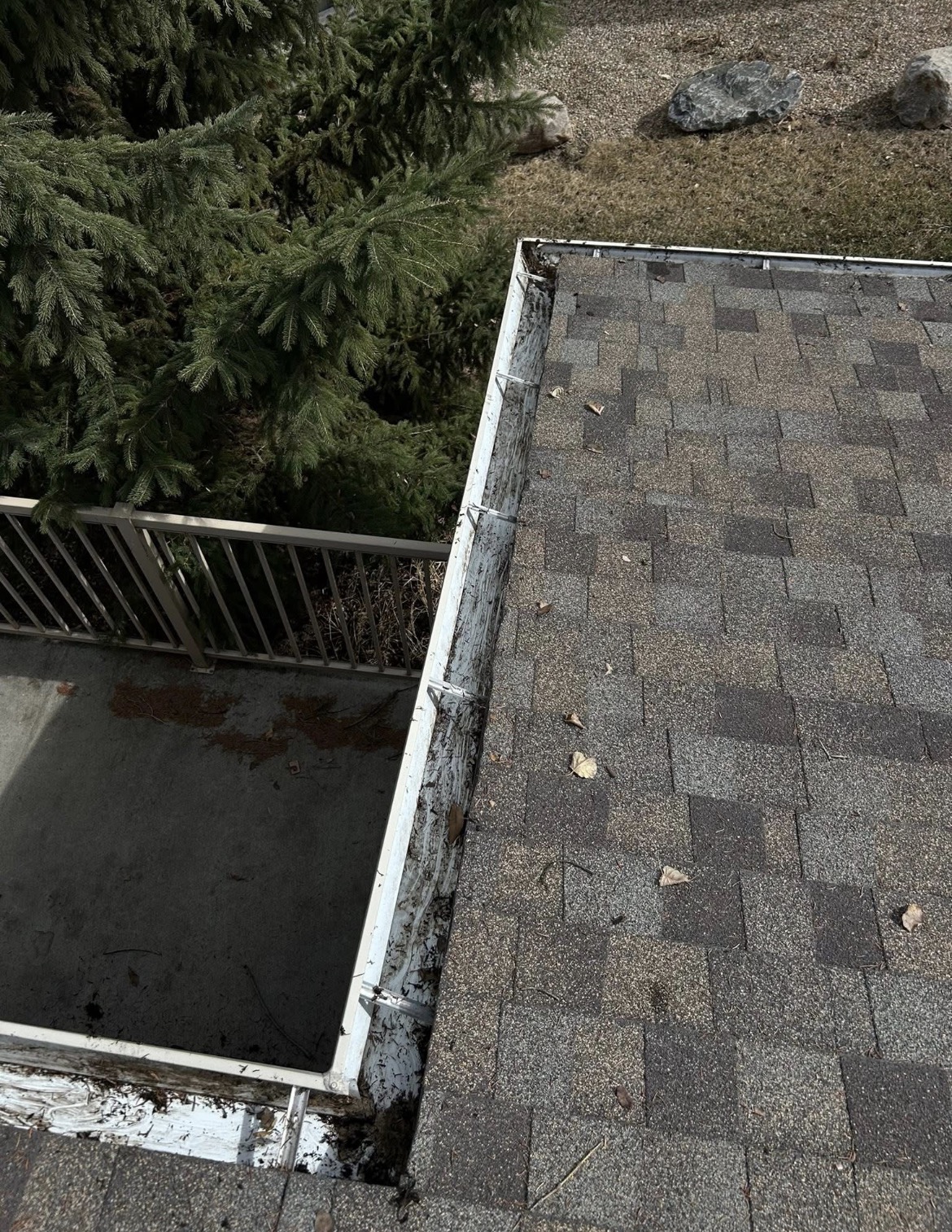 The same gutter run cleared out and flushed